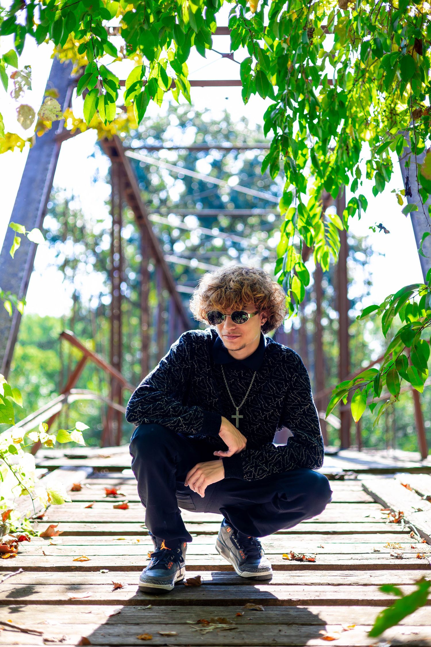 Aldrich MO is where this senior had his photography session near his favorite bridge, New Orleans.