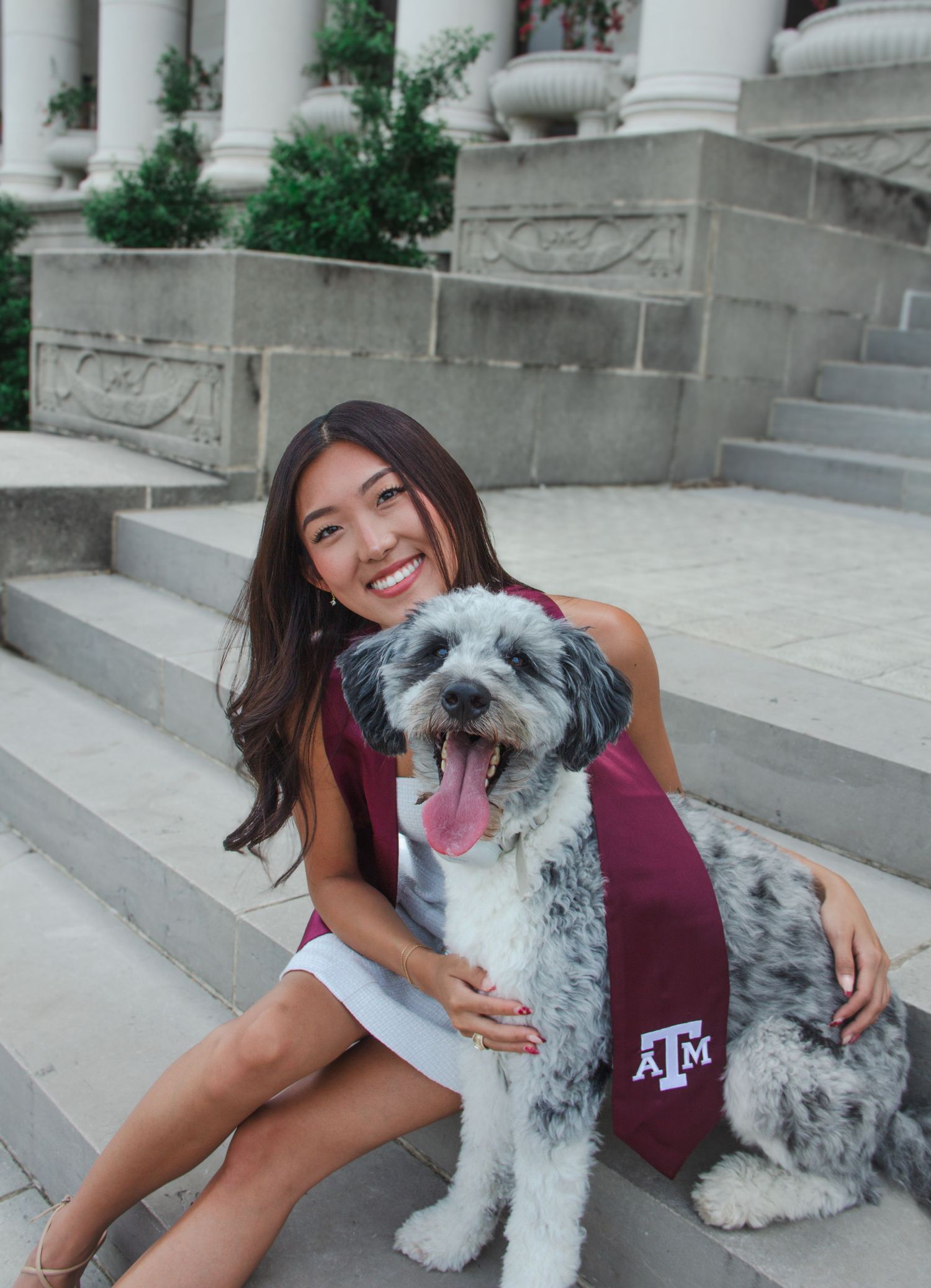 A&M grad with her dog Finn