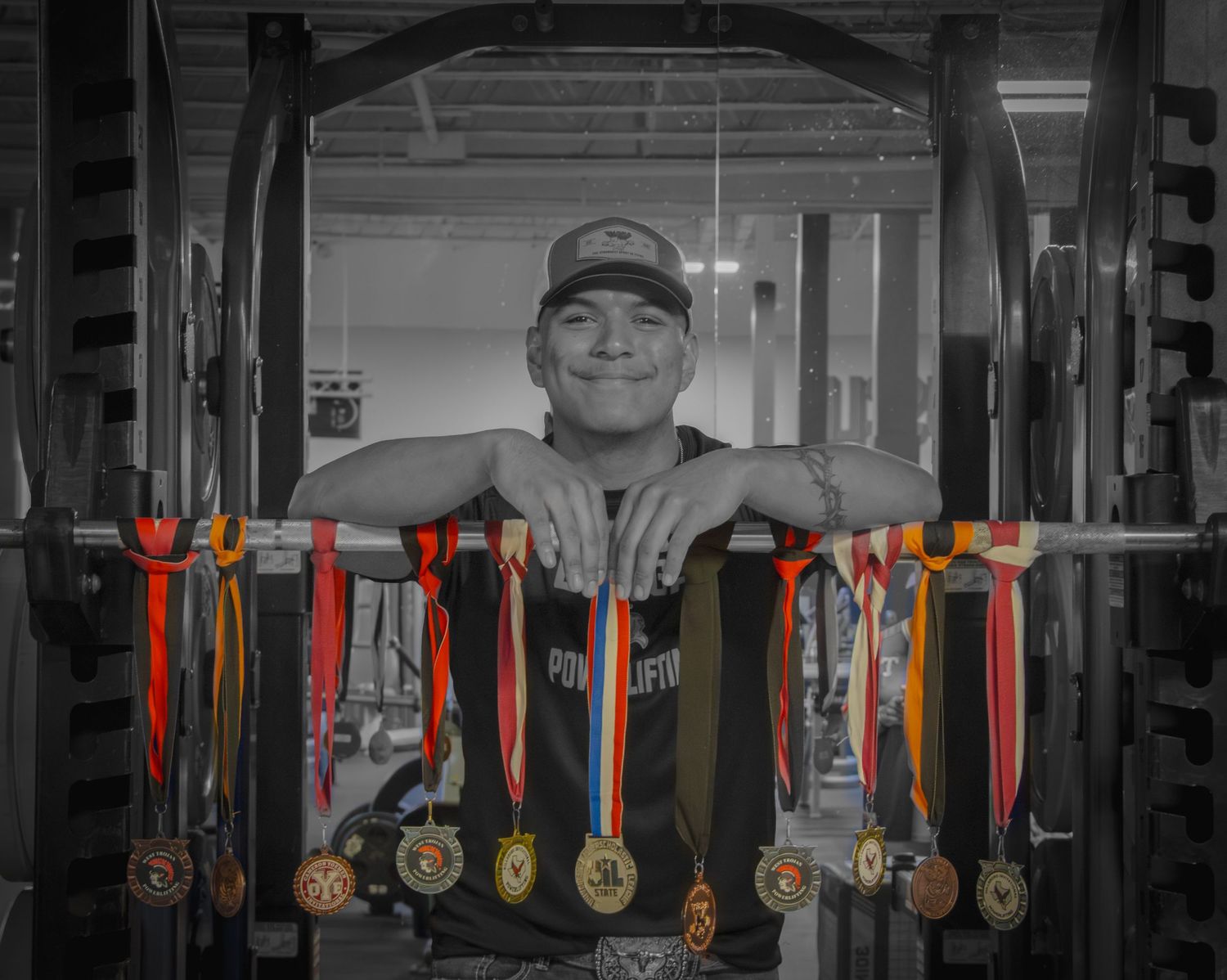 2026 grad with all his medals