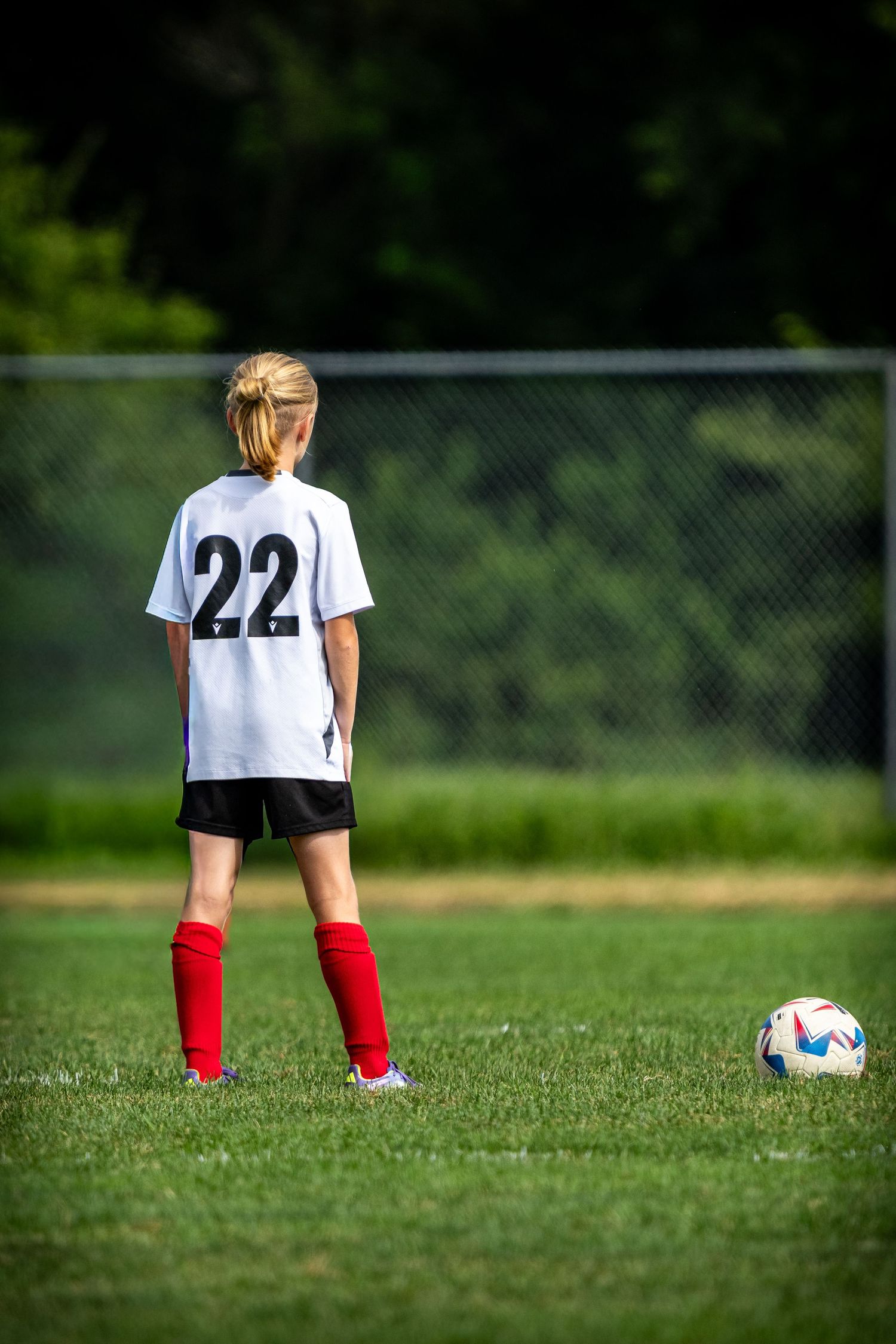 A soccer player prepares for the game