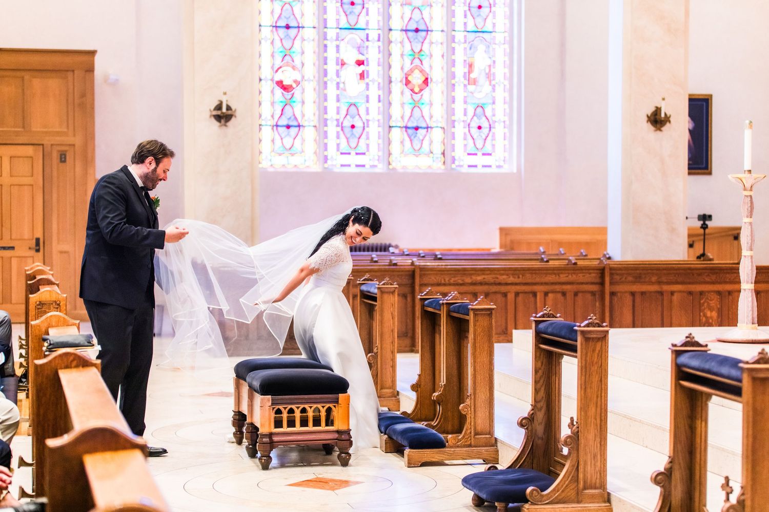 Wedding ceremony sequence in church with stained glass windows and wooden pews.