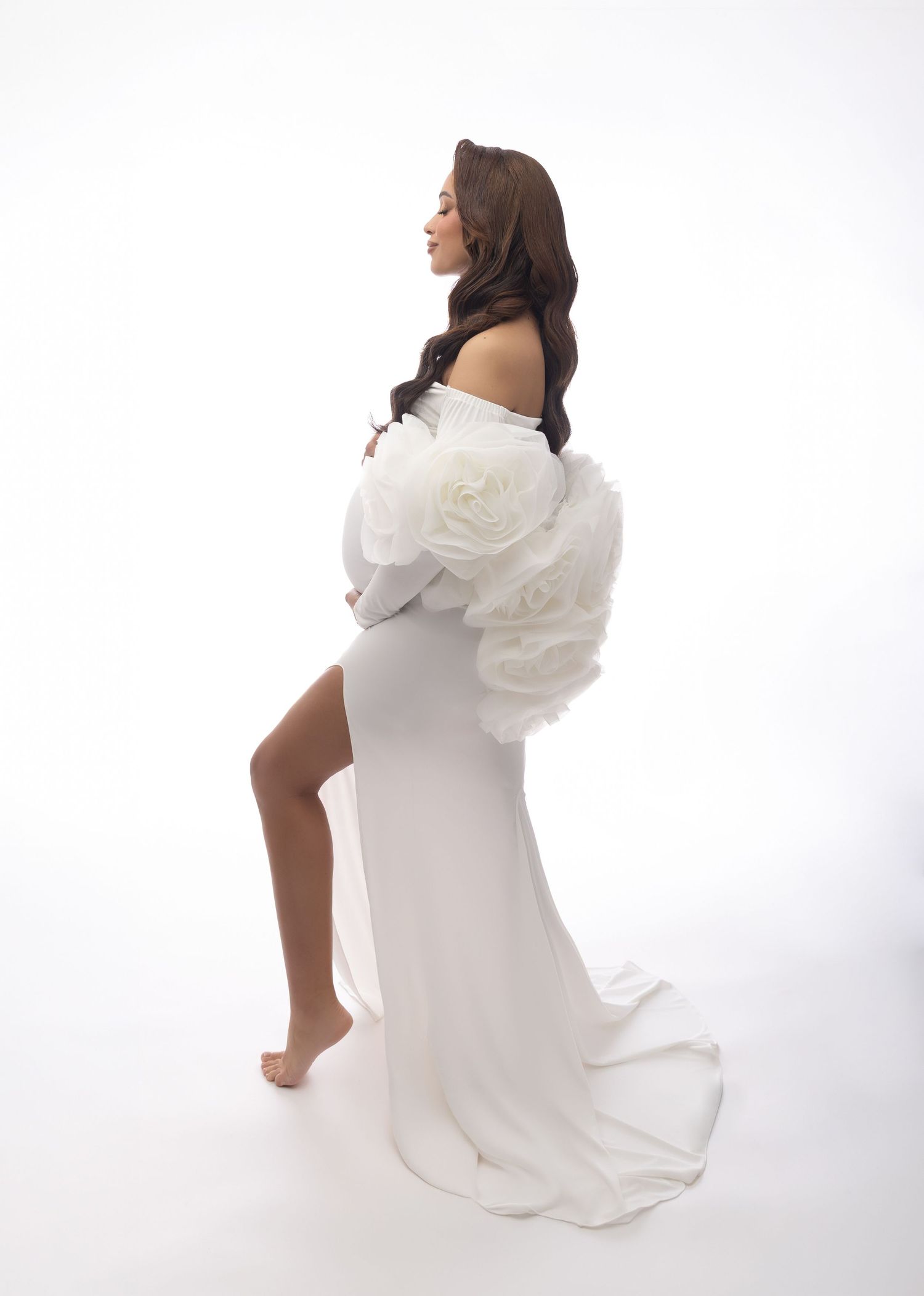 A figure in a white dress poses in multiple artistic positions against a white background.