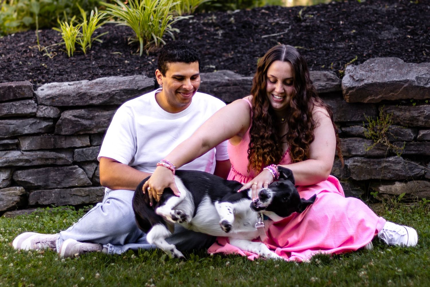 Central PA portrait couple session man and woman sitting with dog in lap by Millie D'Auria Photography