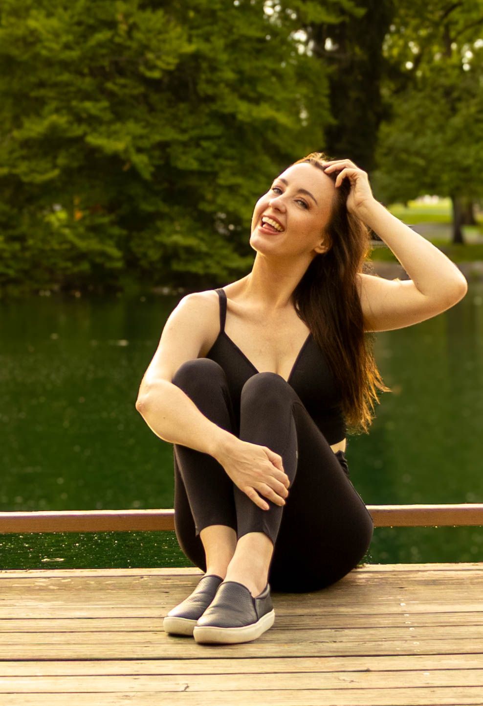 Central PA portrait solo session woman sitting on dock at Long's Park in Lancaster, PA by Millie D'Auria Photography