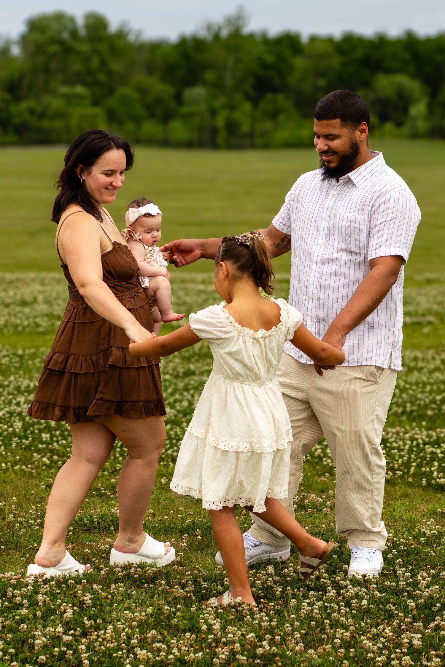 Central PA portrait family session holding hands playing ring around the rosie by Millie D'Auria Photography