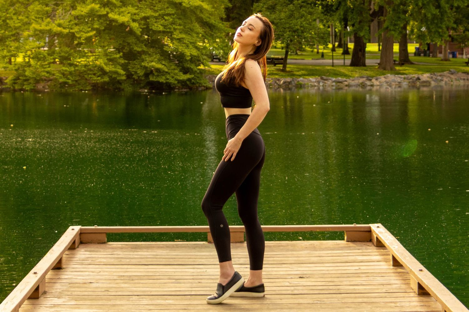 Central PA portrait solo session woman enjoying golden hour sunlight at Long's Park in Lancaster, PA by Millie D'Auria Photography