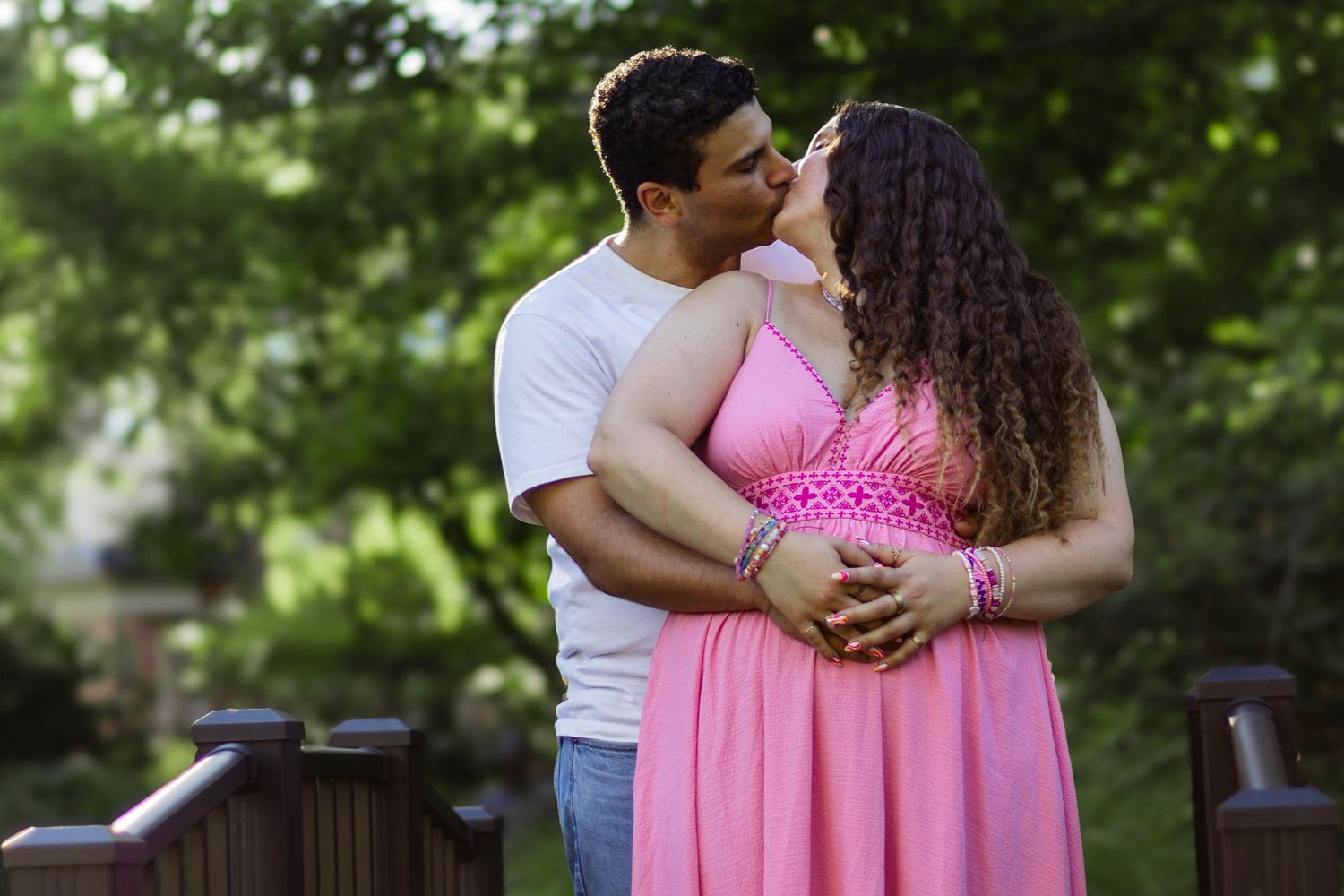Central PA portrait couple session man kissing woman from behind and embracing by Millie D'Auria Photography