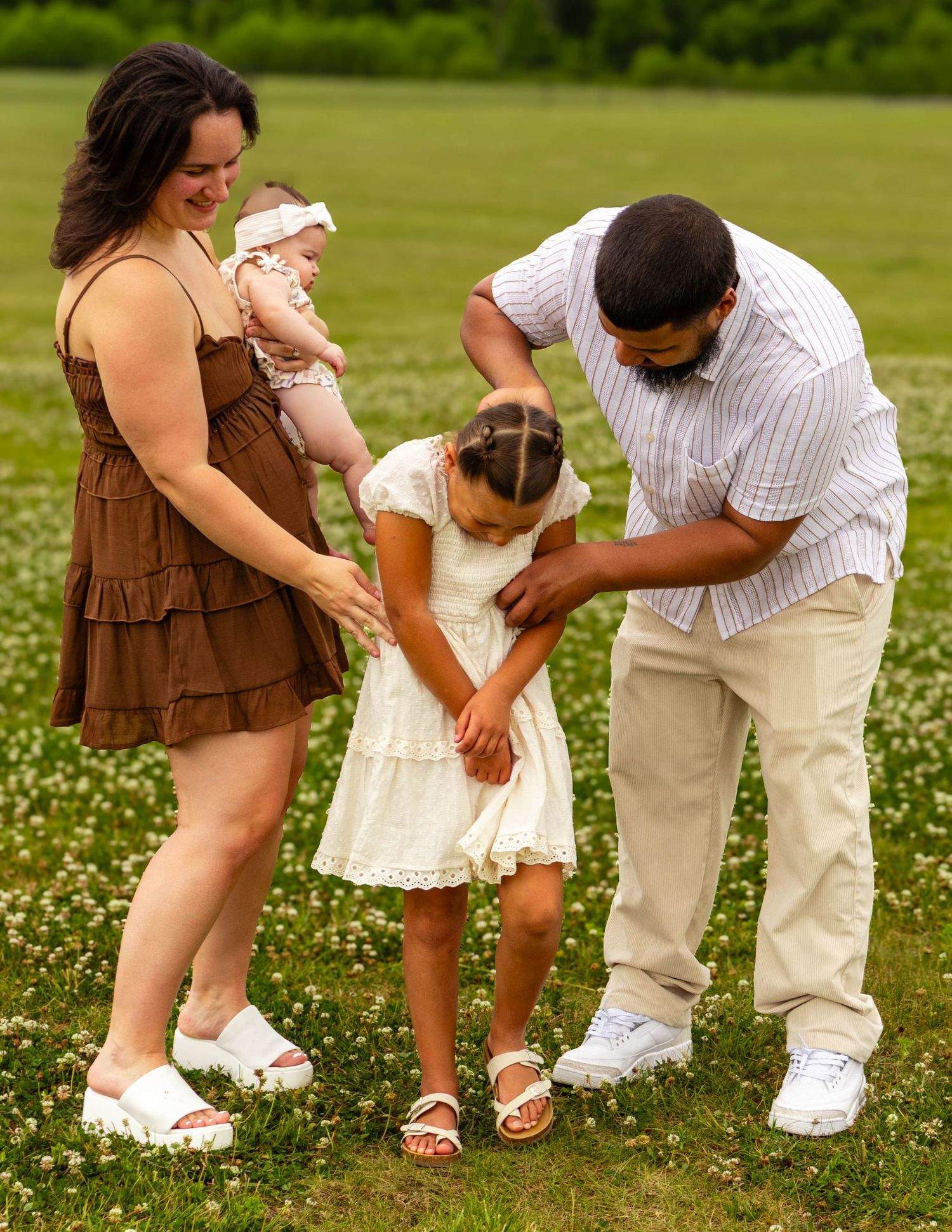 Central PA portrait family session parents having fun with child by Millie D'Auria Photography