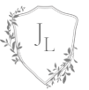 A simple hand-drawn crest design features the initials JL surrounded by decorative floral and leaf embellishments.
