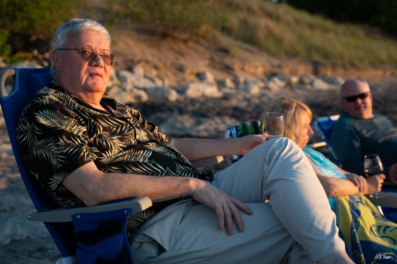 Man sitting in chair at the beach