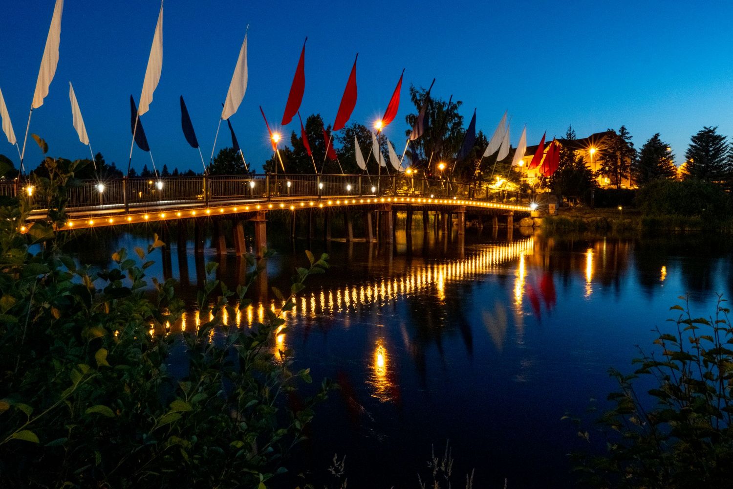 Bridge over river at night
