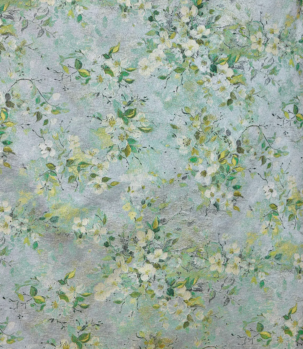 Delicate white and green floral pattern painting on soft sage green textured background.