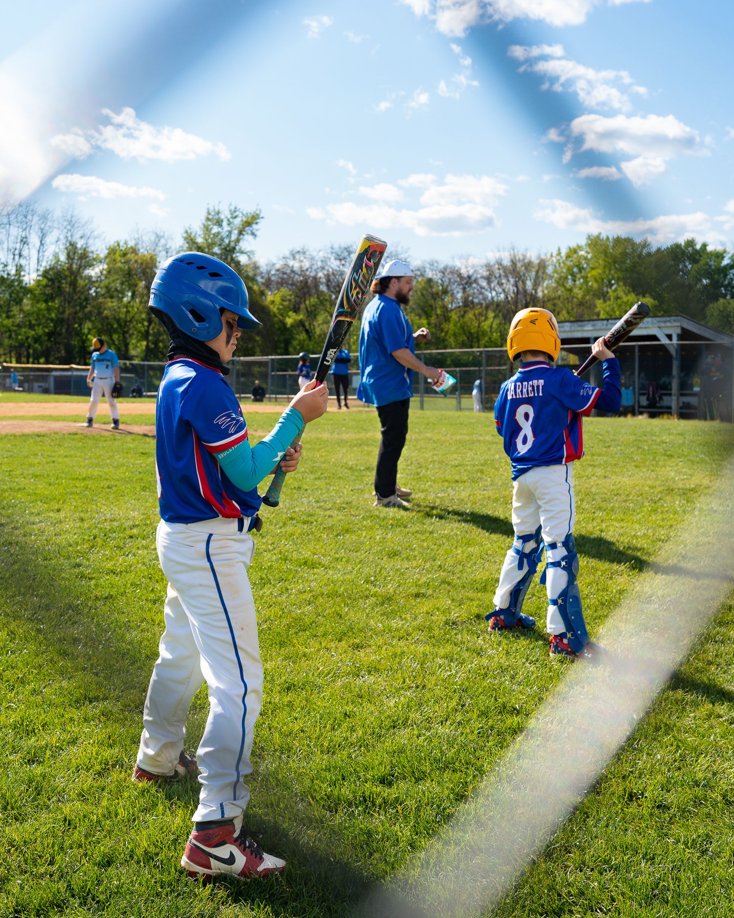 roslyn bluehawks baseball players warming up
