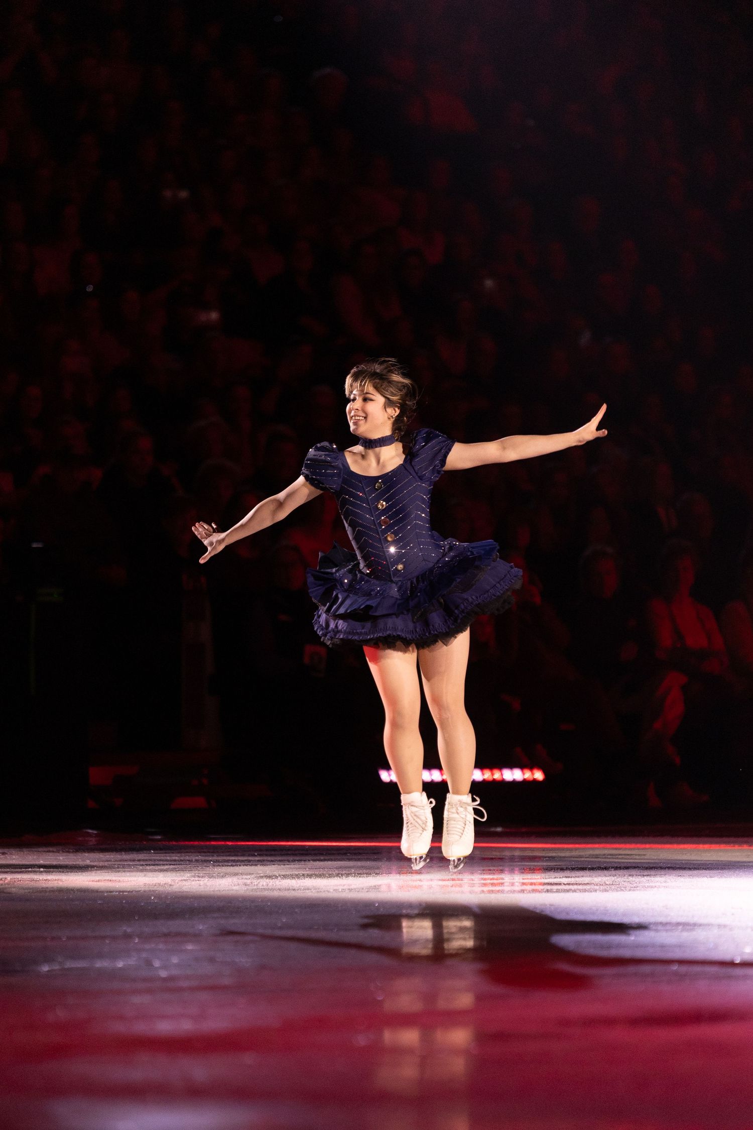 alysa liu, figure skater, hopping up during her stateside program.