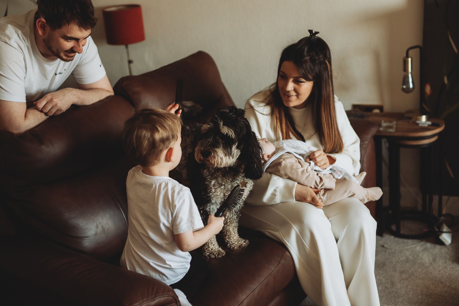 Natural light family photographer in Dundee and Angus capturing real moments during a home photoshoot