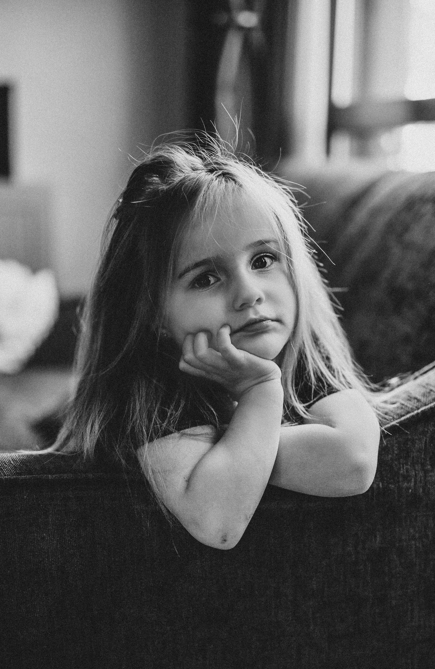 Black and white portrait of a girl during natural family photography session