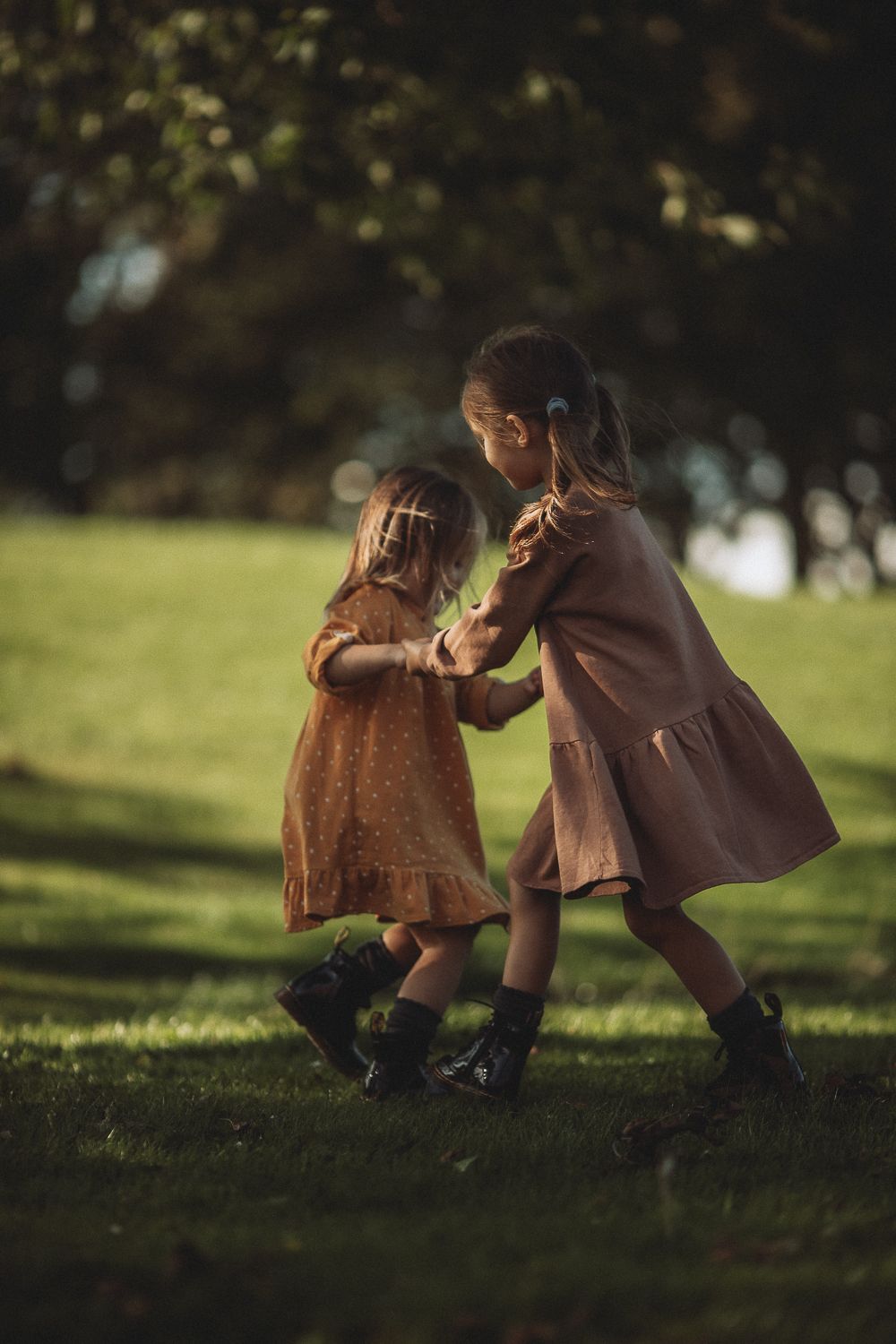 Children laughing during natural family photography session