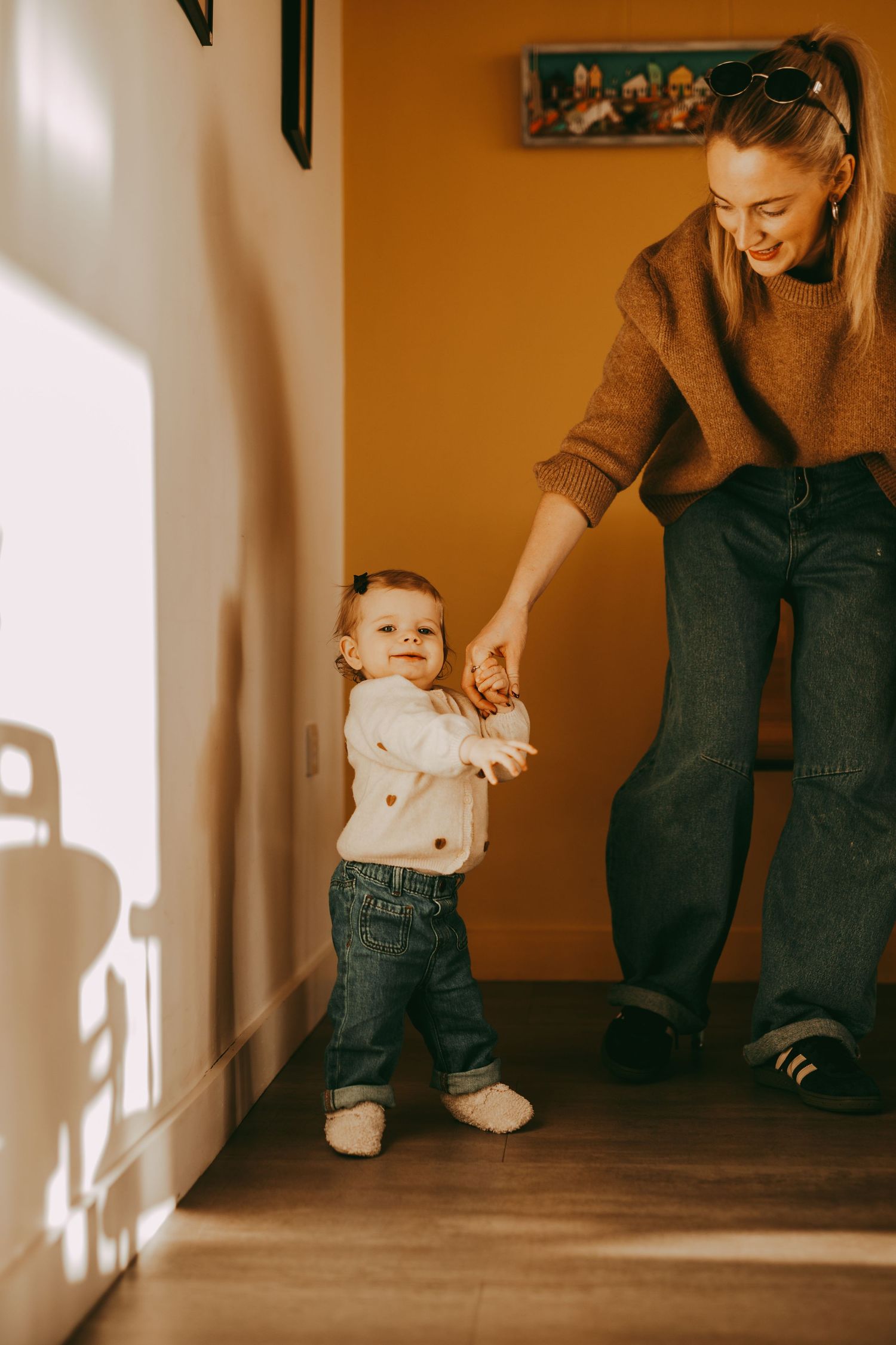 Candid moment between mother and daughter during home photoshoot in Angus