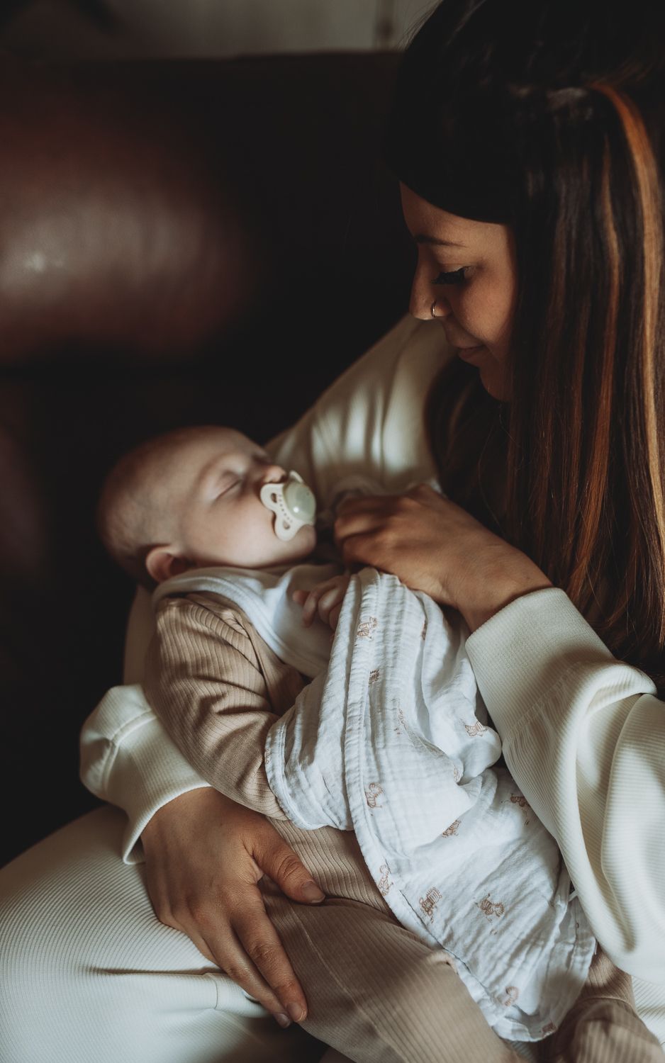 Natural light family photographer in Dundee and Angus capturing real moments during a home photoshoot