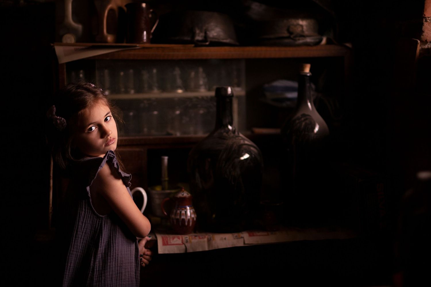 A child during a family photoshoot indoors
