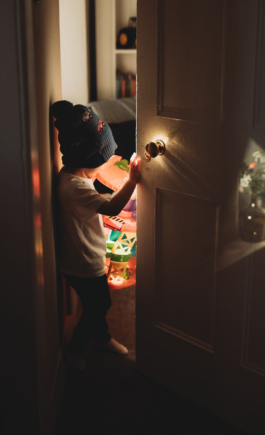 Natural light family photographer in Dundee and Angus capturing real moments during a home photoshoot