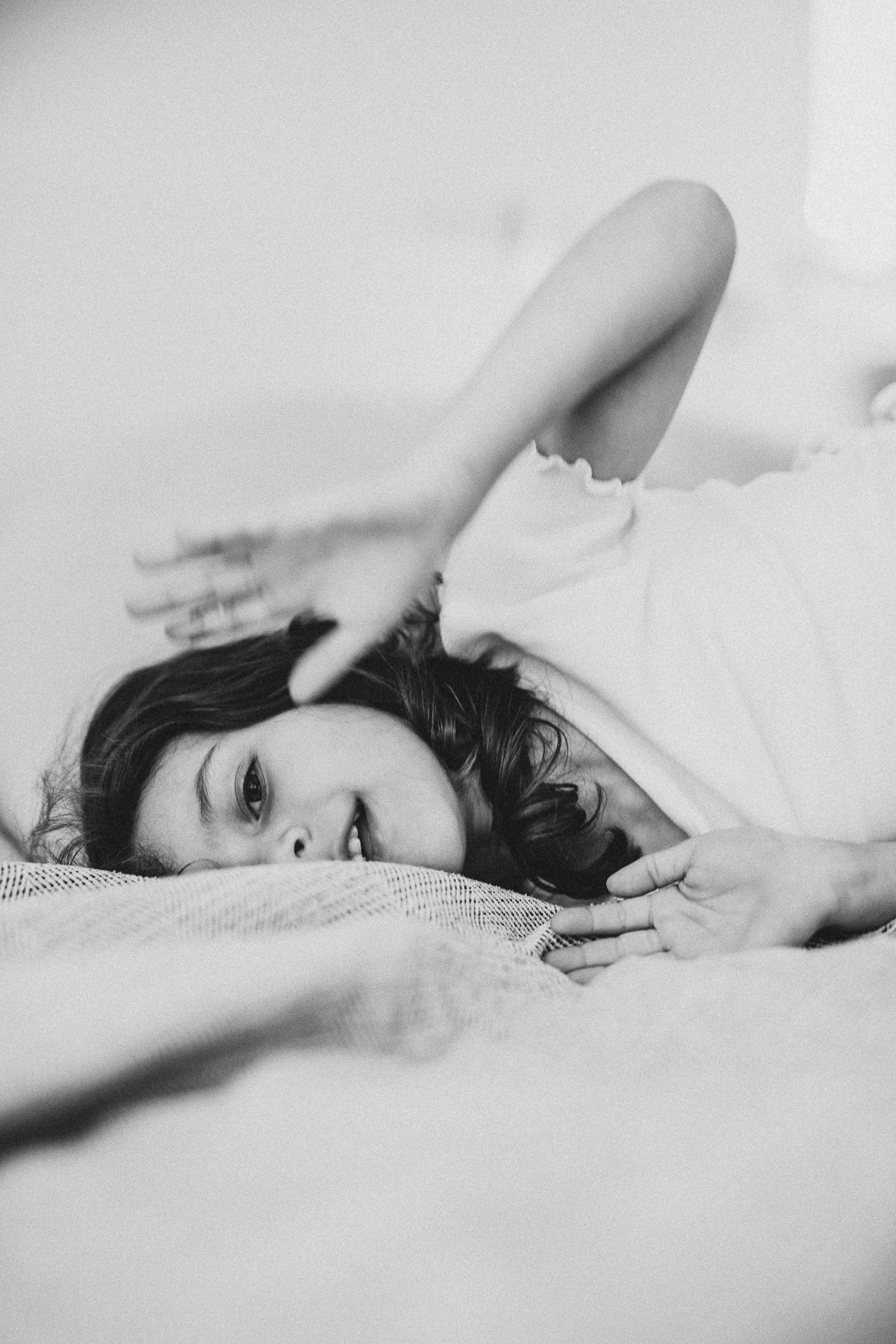 Black and white portrait of a girl during natural family photography session