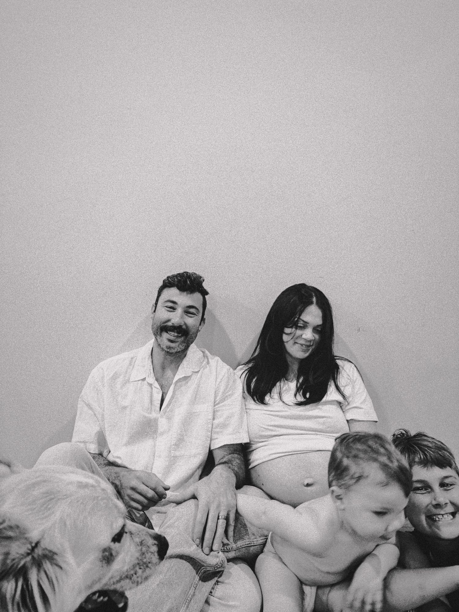 Maternity at home candid timeless session. Maternity denim and white tee shirt shoot. Natural laid back photography