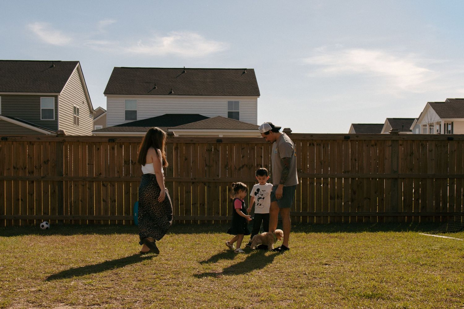 Natural documentary realistic lifestyle in the moment family photography. Family playing.