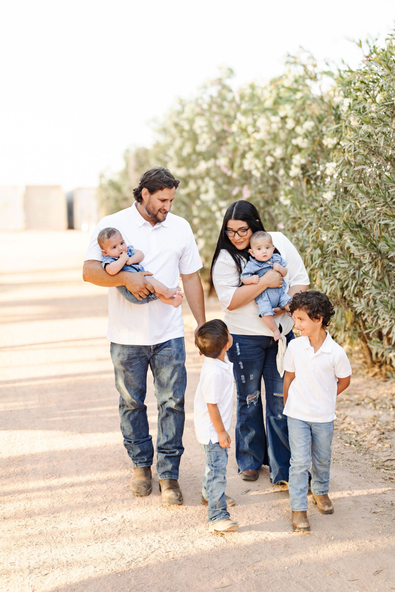 light and airy family photos. Candid family moments. Family photo with baby twins. Boy mom photography. San tan valley arizona family photo