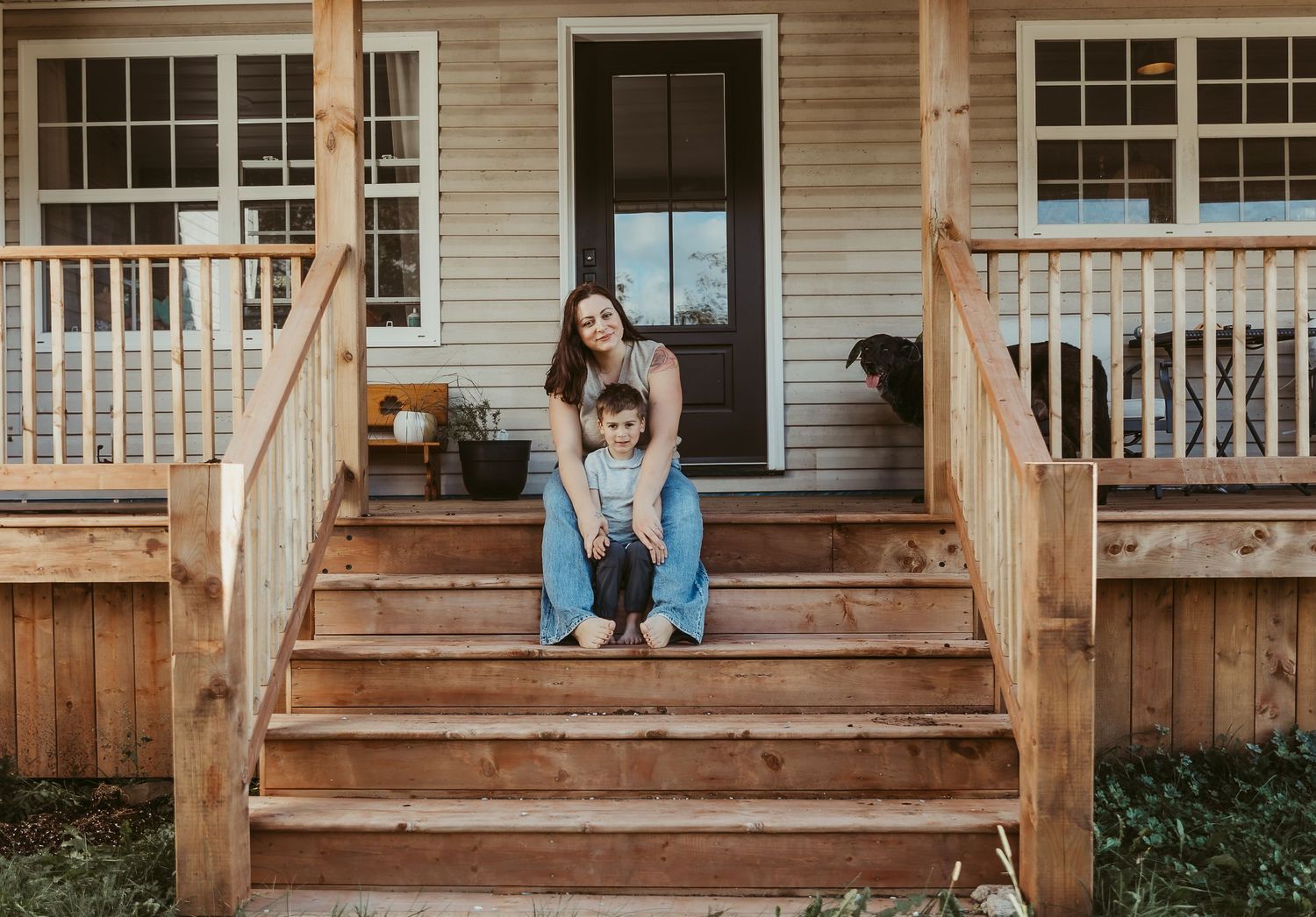 mom and her son on their front porch