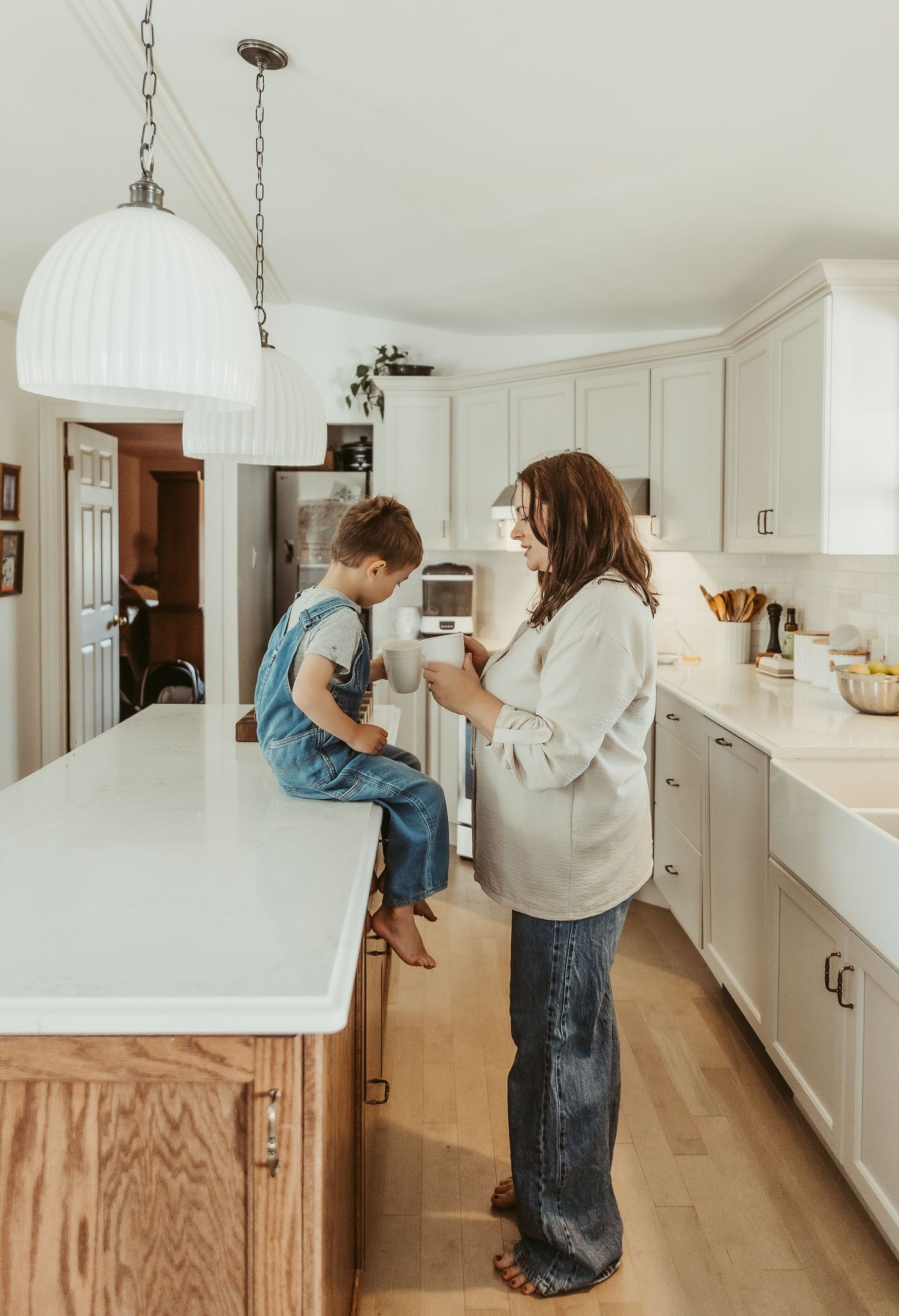 Moncton New Brunswick Maternity & Newborn photography in home lifestyle photoshoot mom and son in kitchen