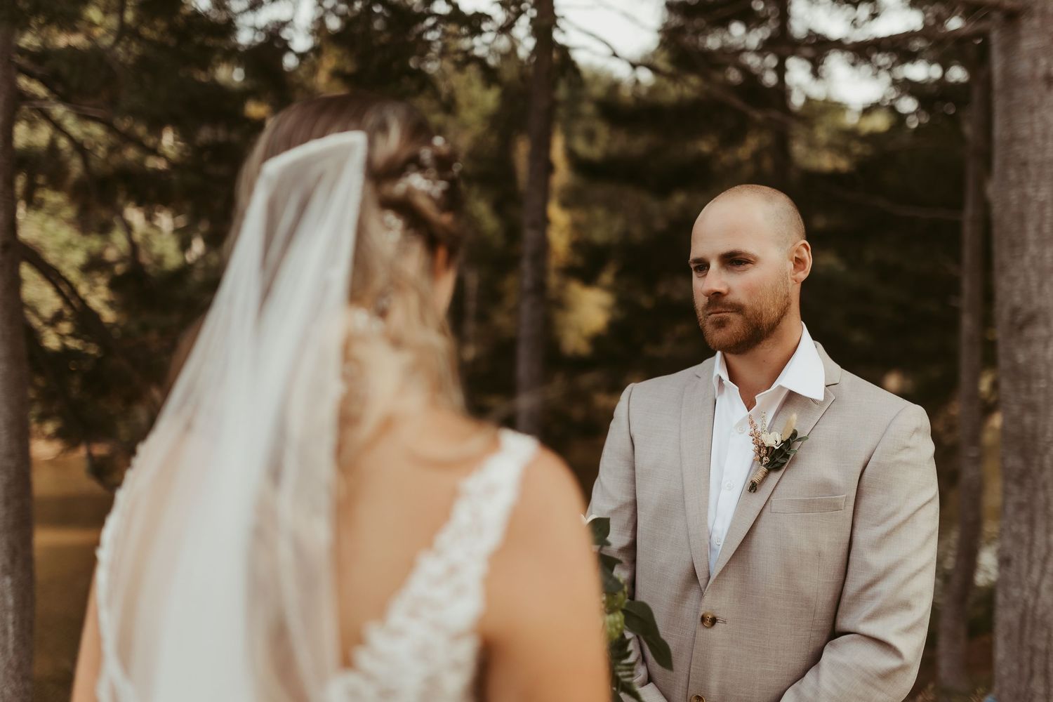 couple reading vows groom gets emotional