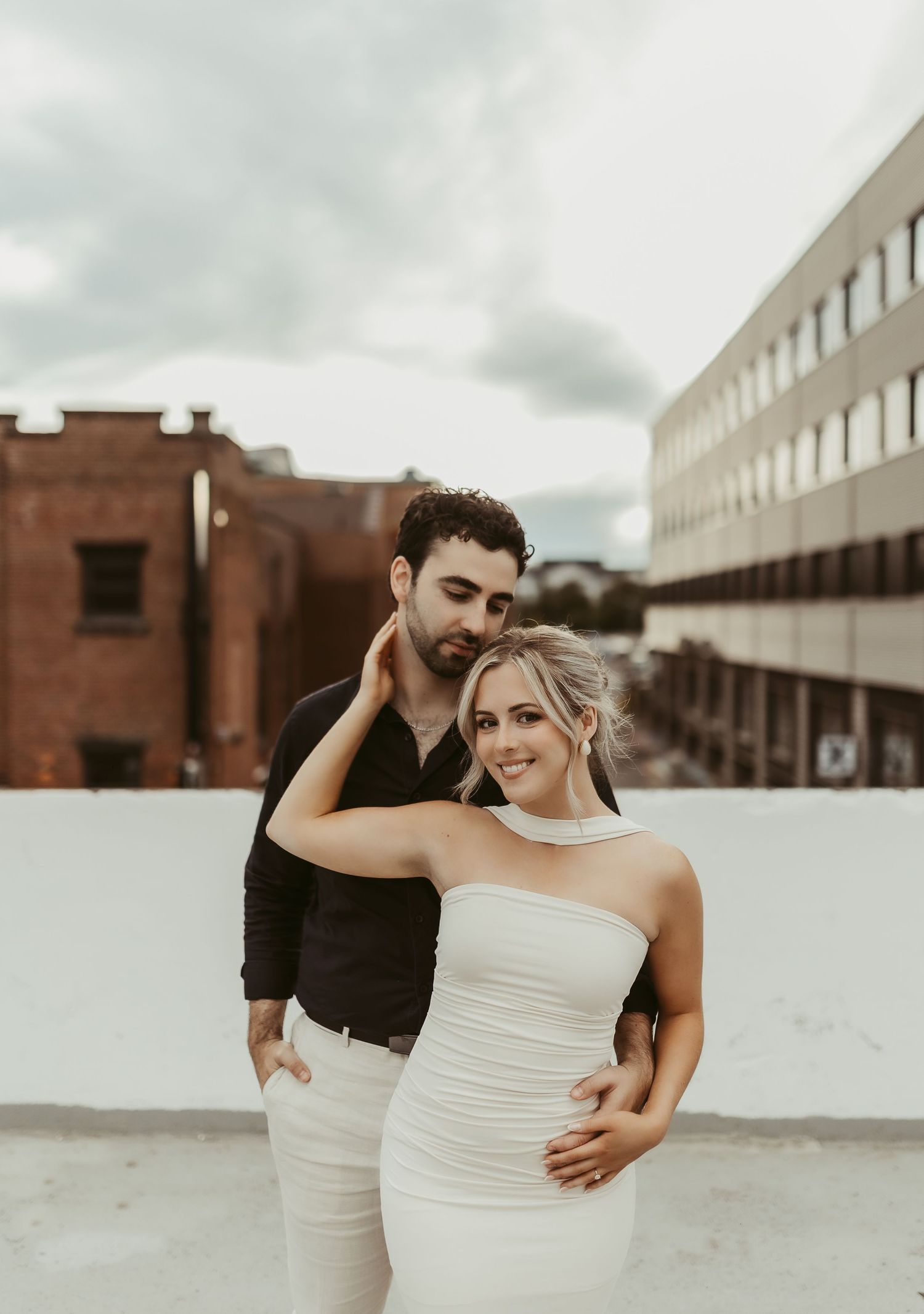 Moncton New Brunswick wedding photographer parking garage couple engagement golden hour