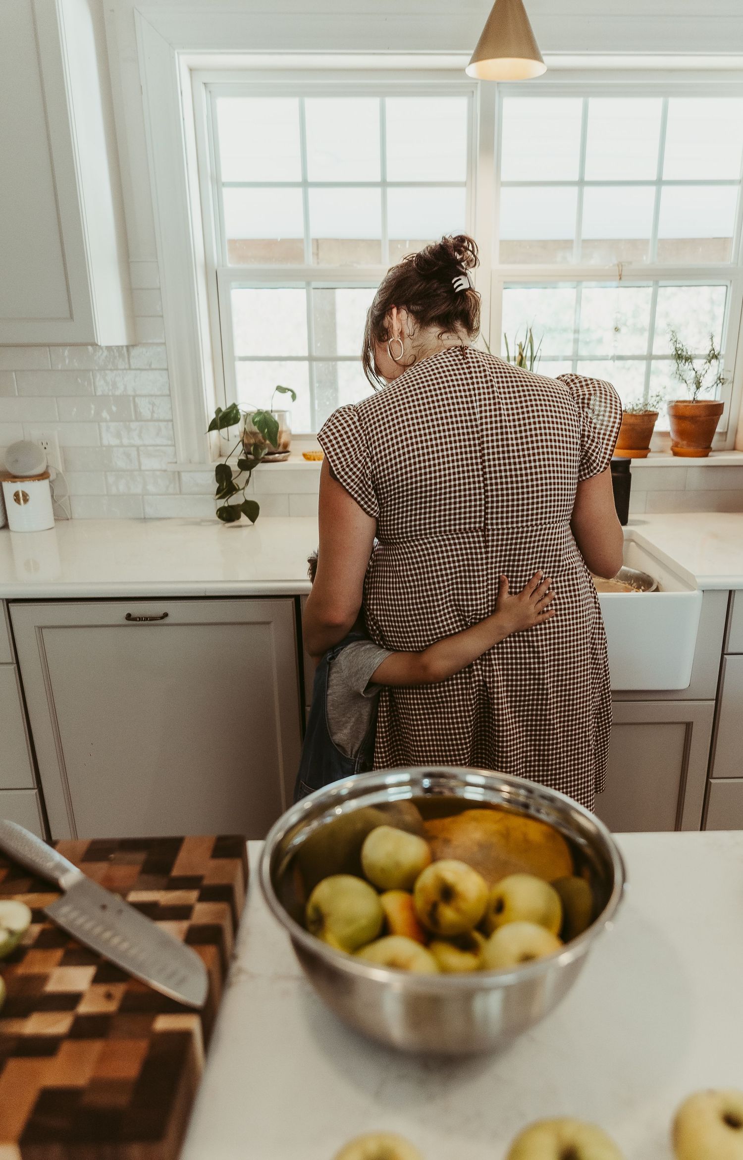 Moncton New Brunswick Maternity & Newborn photography in home lifestyle photoshoot mom and son in kitchen
