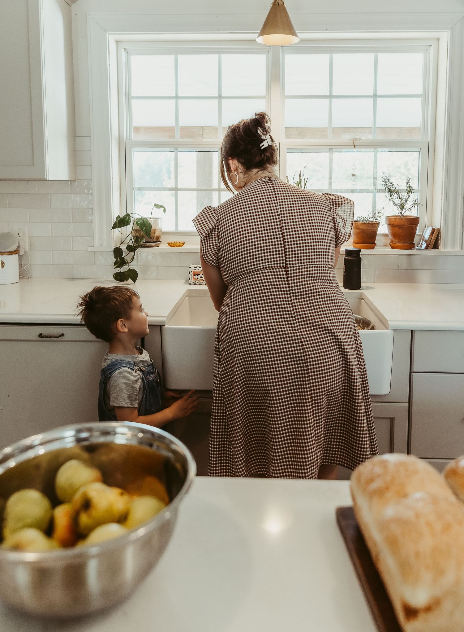 Moncton New Brunswick Maternity & Newborn photography in home lifestyle photoshoot mom and son in kitchen