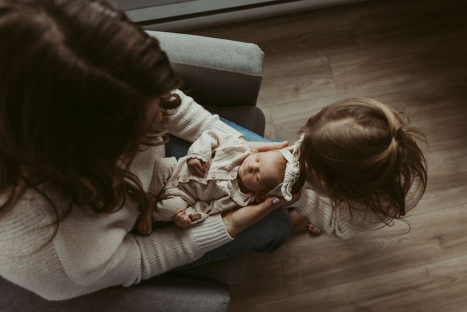 Moncton New Brunswick Maternity & Newborn photography big sister admires new baby sister