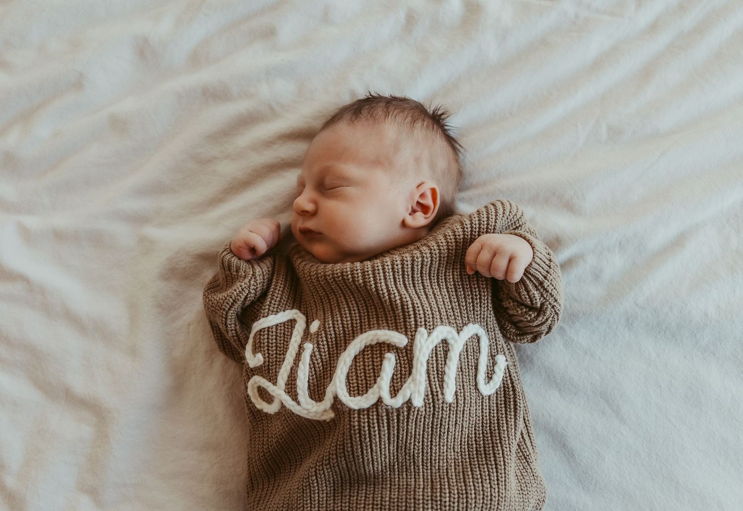 in home newborn session in warm tones