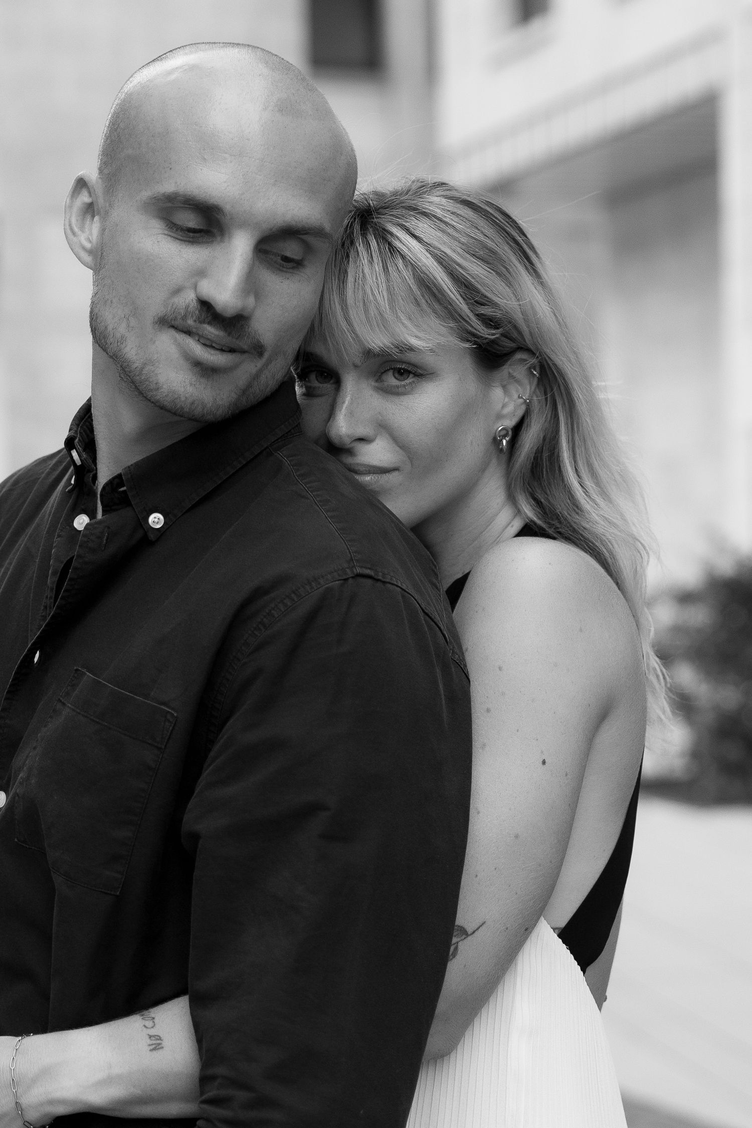 Couple embracing in a romantic black and white portrait