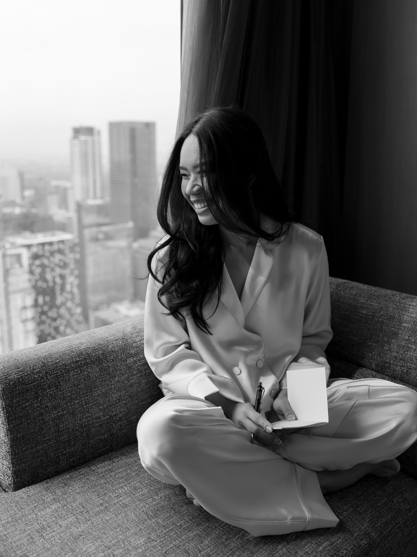 Bride looking down (B&W): Editorial bridal portrait session optimized for a sophisticated and cinematic visual legacy