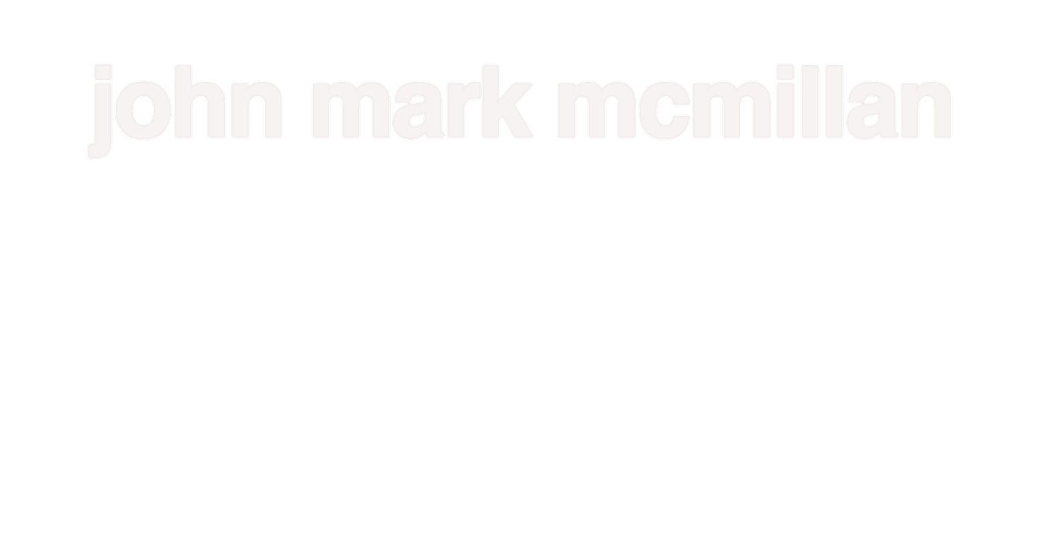 John Mark McMillan name text logo displayed in light gray on white background.