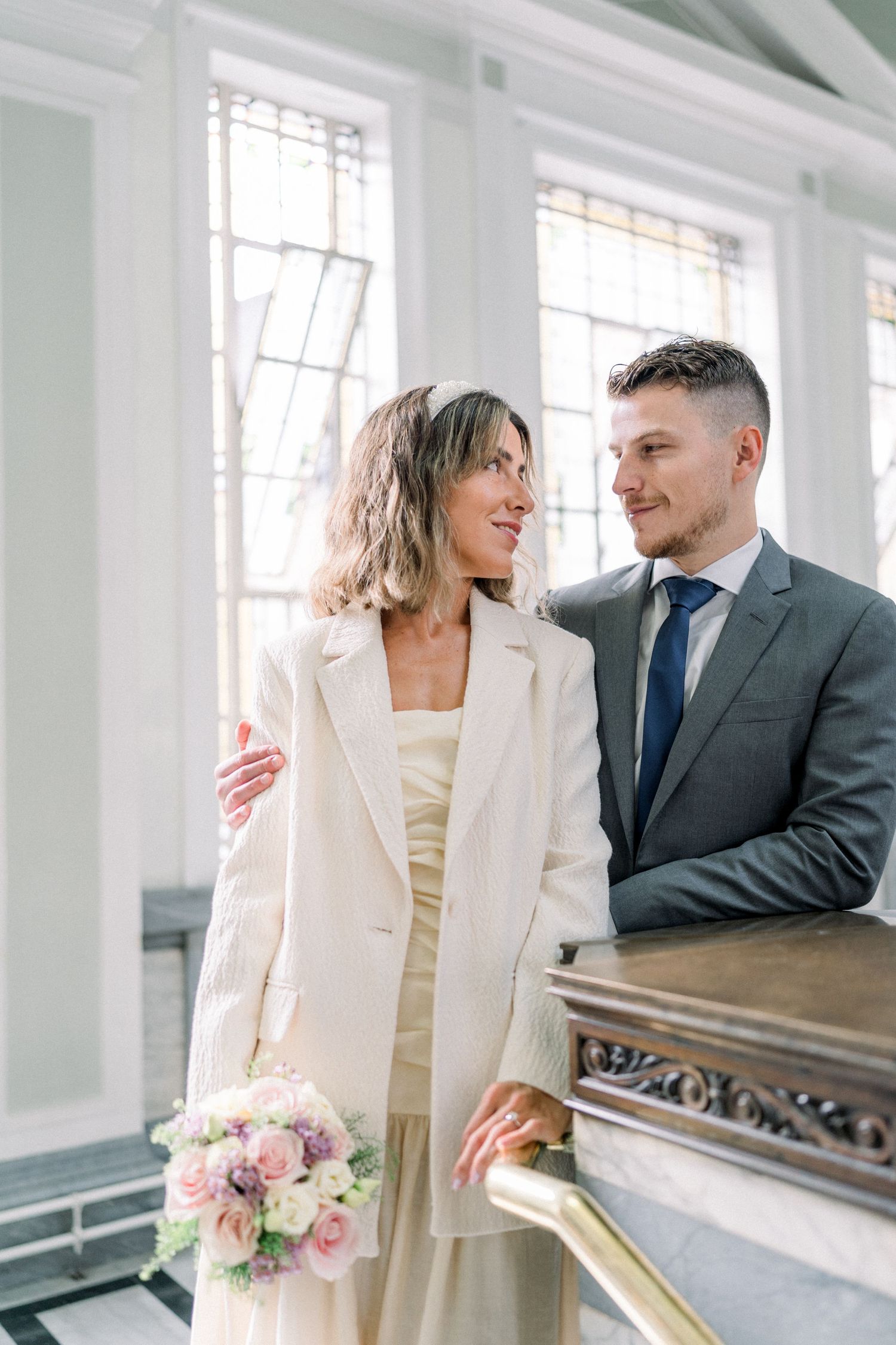 Bride and groom lovingly gazing at each other after their Islington Town Hall ceremony on a romantic Central London elopement wedding day