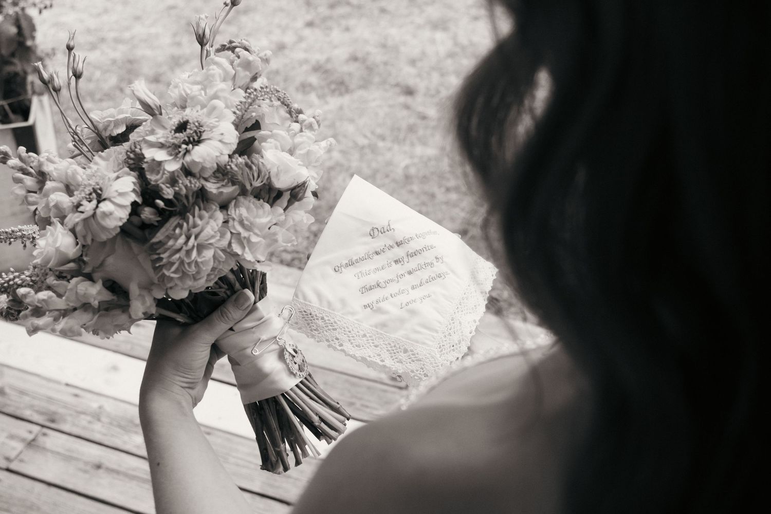 Detail photos of a bride holding sentimental items at her wedding captured by Savvy Photography - Seattle Wedding Photographer