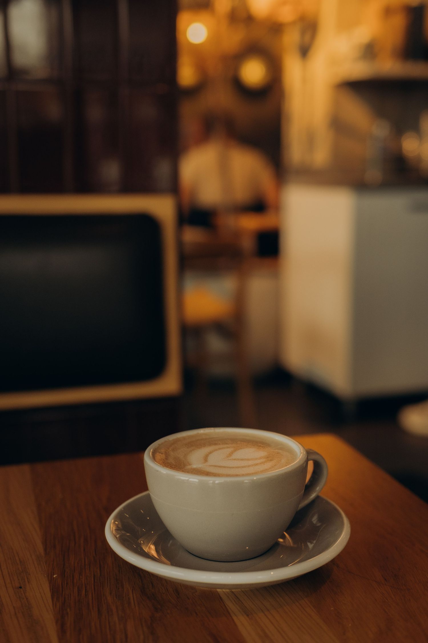 cup of cappuccino on a table in café Volta during interview with an event manager for networking events in Stockholm