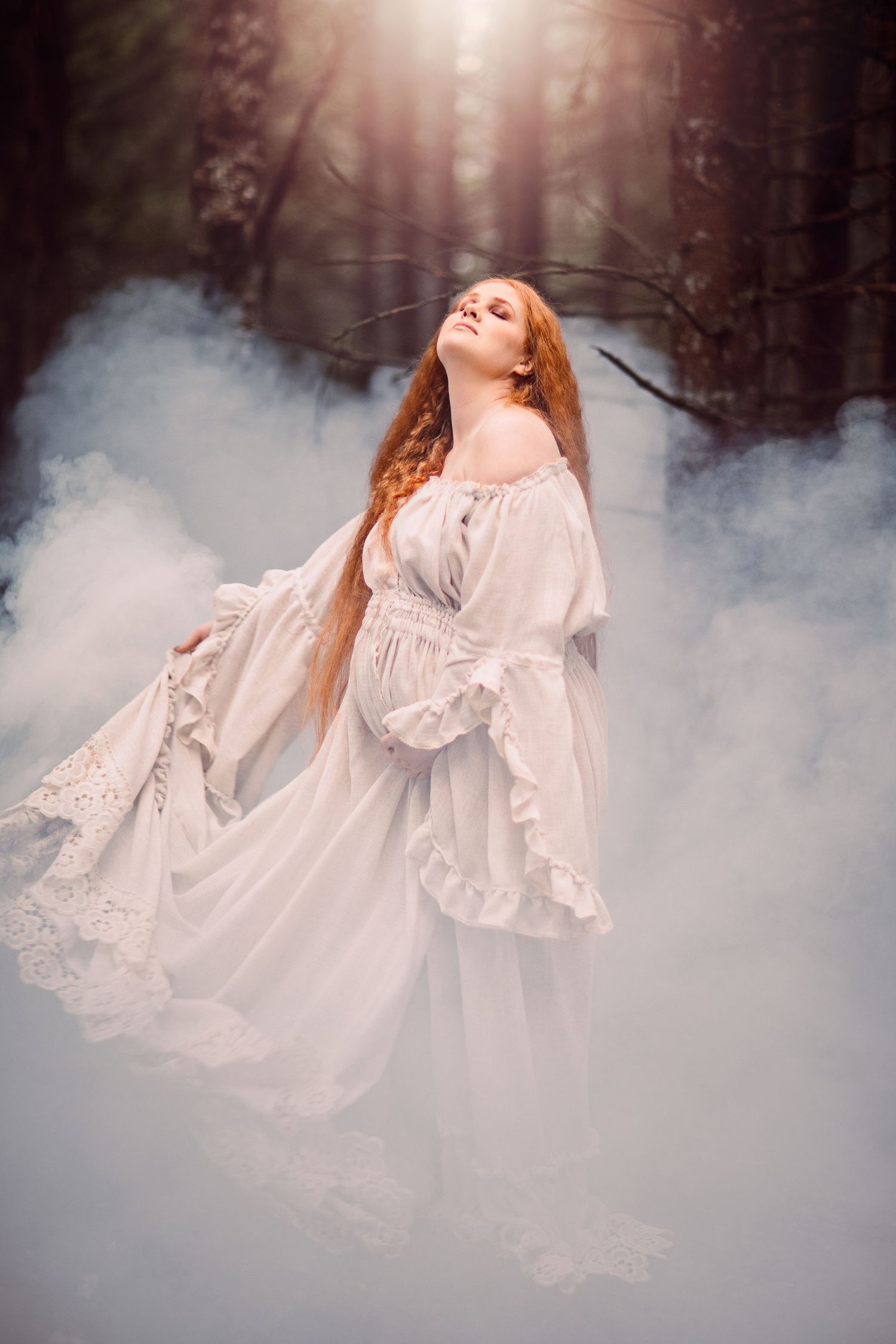 Ethereal scene of a figure in flowing white lace dress surrounded by mystic fog in a sunlit forest setting.