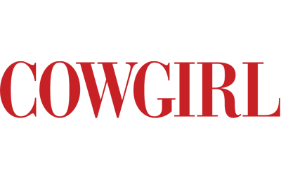 Cowgirl magazine masthead in bold red serif typography.