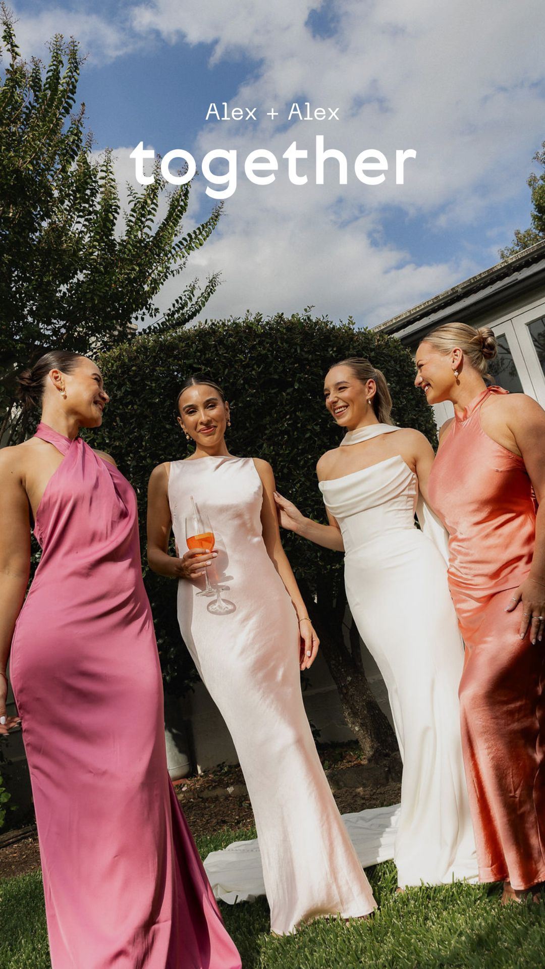Four women in elegant satin gowns celebrate outdoors at a wedding, with text reading Alex + Alex Together.