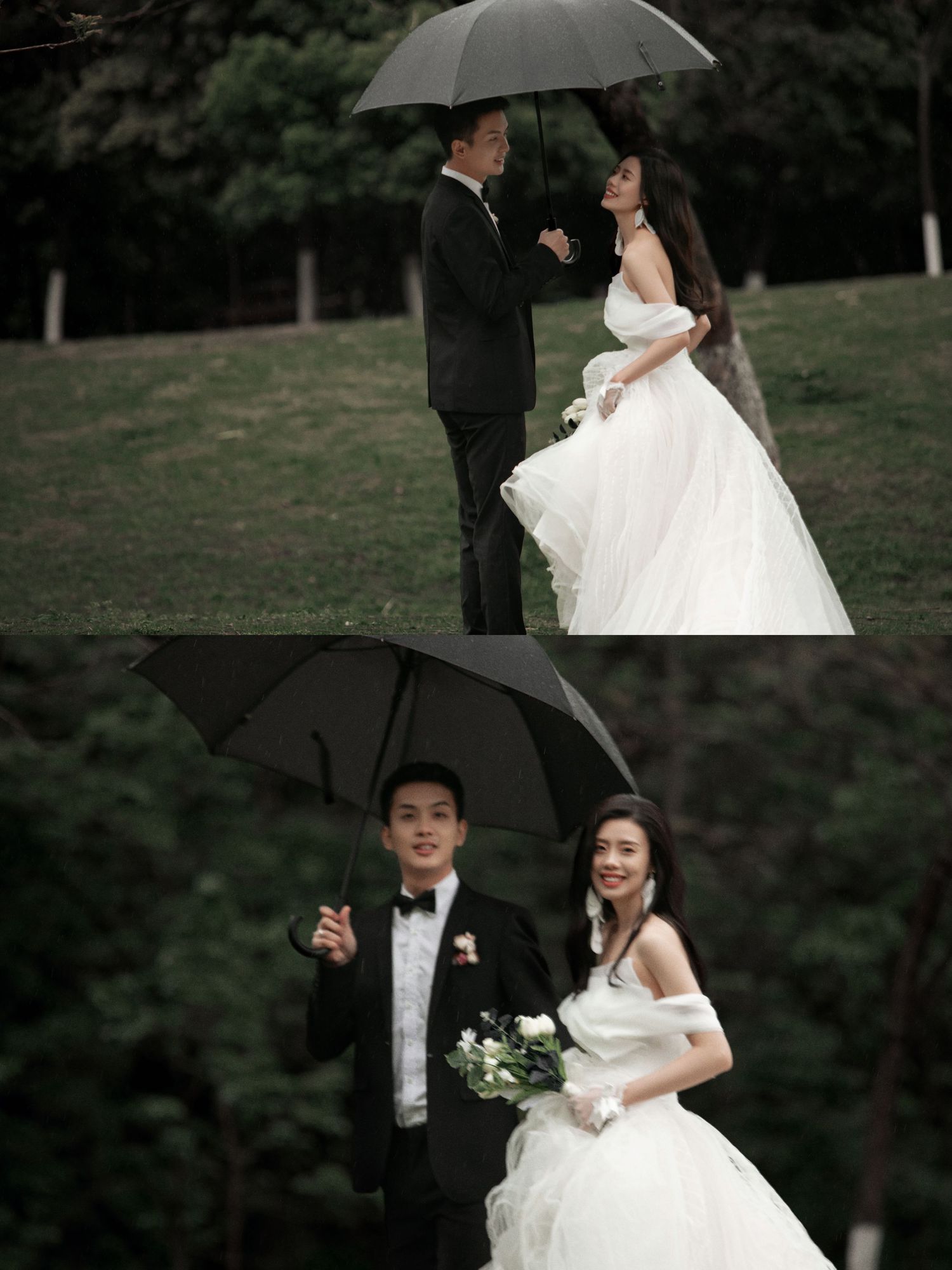 A couple shares a romantic rainy day wedding photo shoot under a black umbrella on a lush green hillside.