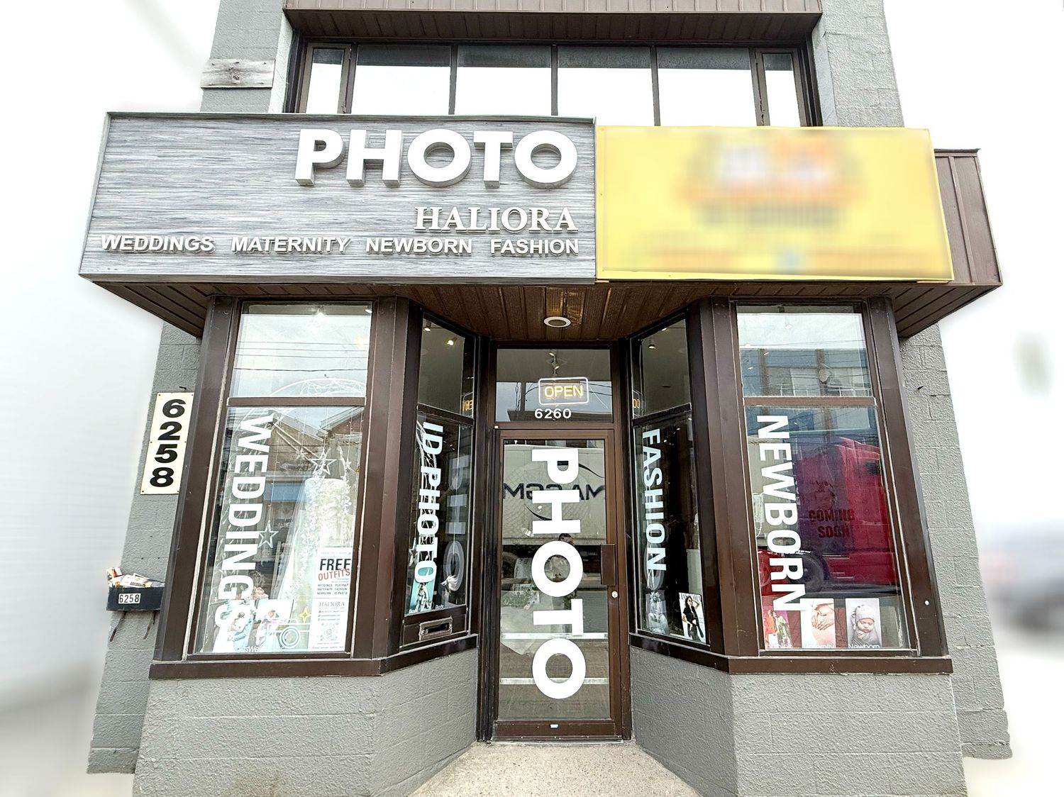 Exterior of Photo Haliora studio offering weddings, maternity, newborn, and fashion photography services.