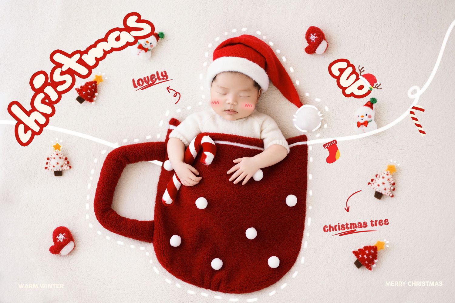 Sleeping newborn baby in red knit Christmas cup prop wearing Santa hat surrounded by festive holiday decorations.