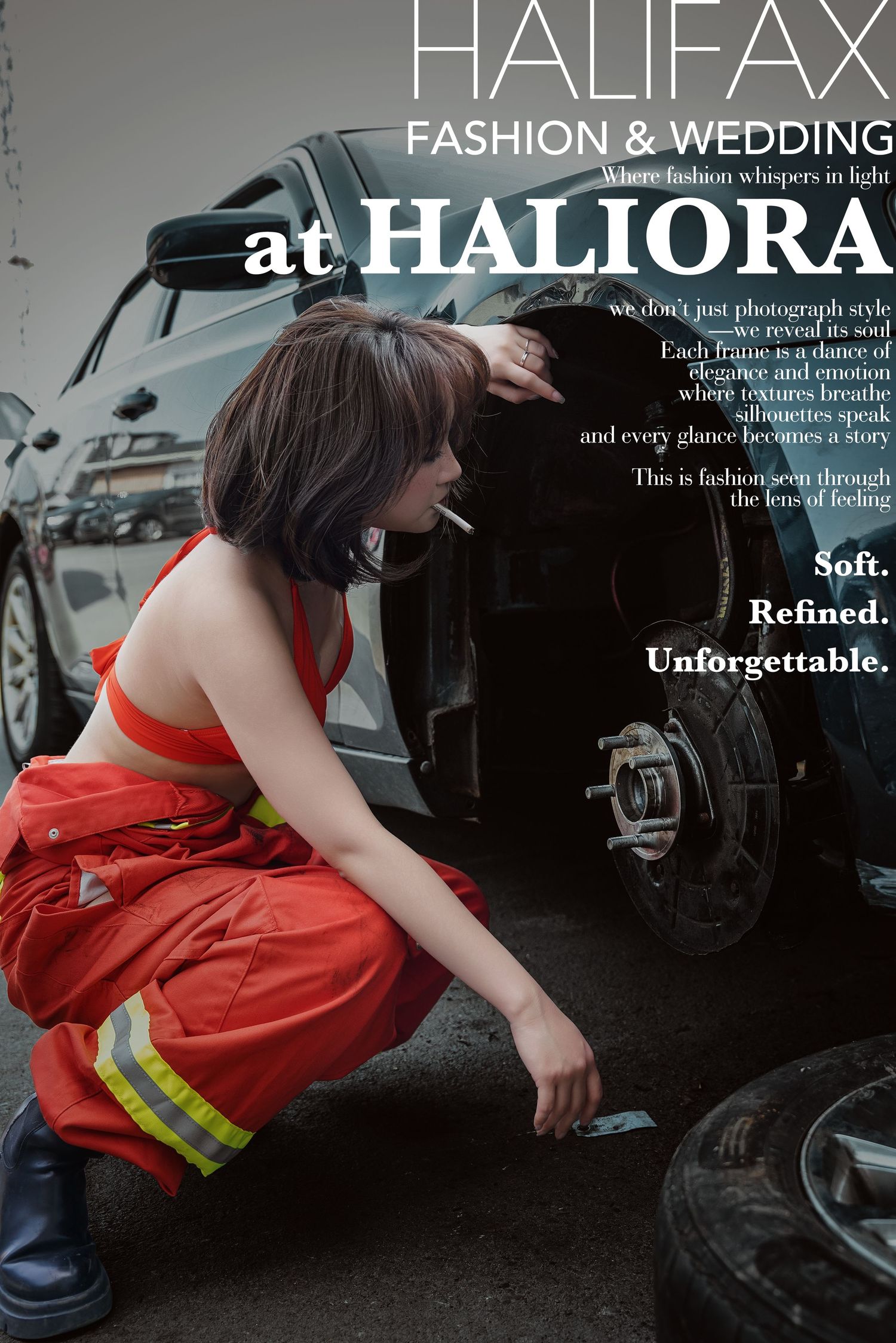 Woman in red firefighter overalls crouches beside a tire near a car for Halifax Fashion & Wedding Haliora campaign.